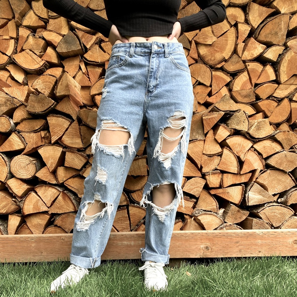 Light blue ripped jeans